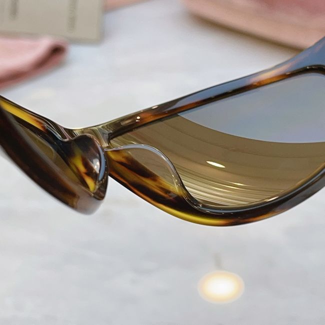 MiuMiu Sunglasses 821487-7