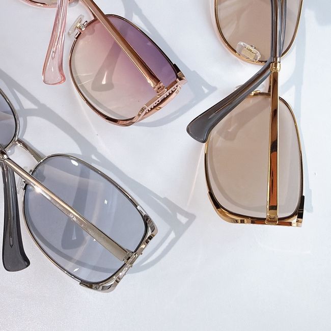 MiuMiu Sunglasses 821490-7